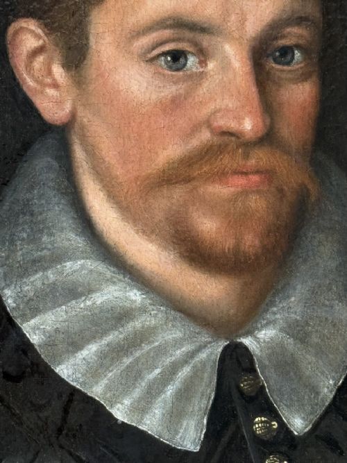 fig 5. An oil painting depicting a seventeenth-century gentleman wearing a dark embroidered doublet and pleated white ruff, encased in a heavily carved giltwood frame.