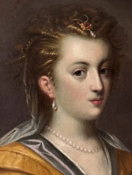 fig 5. An antique oil painting depicting the bust portrait of an Italian Renaissance noblewoman wearing pearl jewellery and a gold gown against a dark background.