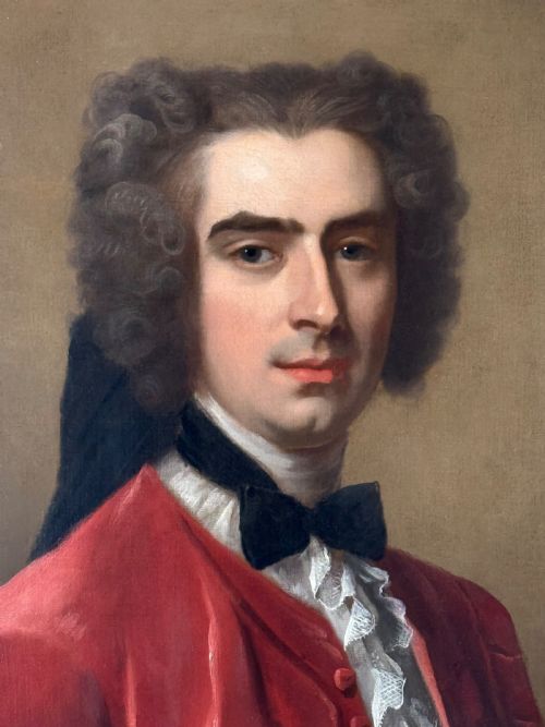 fig 1. An 18th-century oil painting depicting a gentleman in a scarlet jacket with a white cravat, framed in an ornate gilded Rococo-style frame.