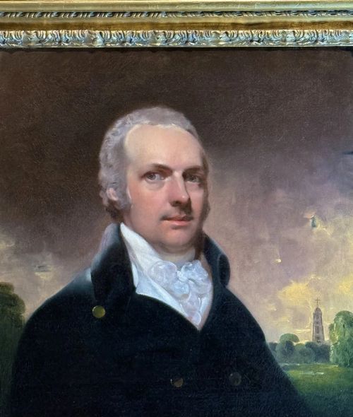 fig 1. An 18th-century oil portrait painting depicting a gentleman in a dark double-breasted coat and white cravat set inside a gilded frame.