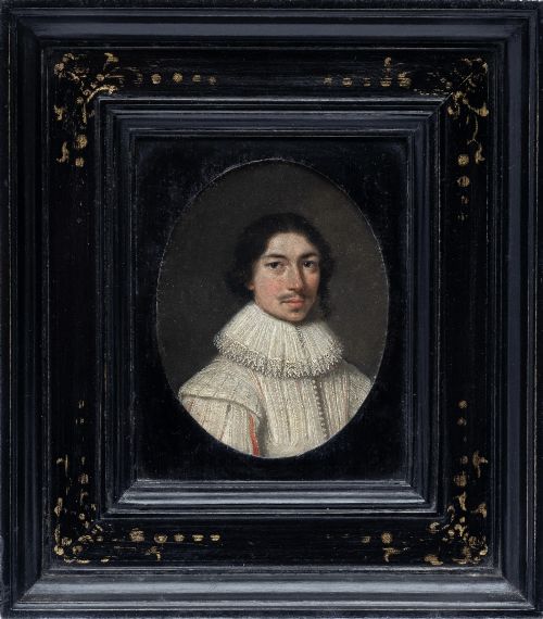 fig 1. An oval 17th-century oil portrait miniature on copper depicting a gentleman with a mustache and lace collar in a black ebonised frame with gilt detail.