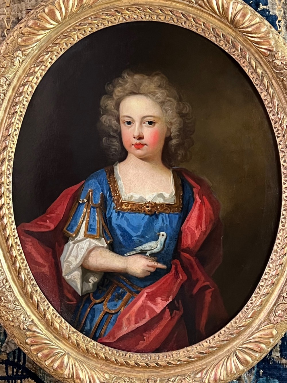 EARLY 18TH CENTURY PORTRAIT OF A BOY IN  CLASSICAL DRESS - ATTRIBUTED TO CHARLES D’AGAR.
