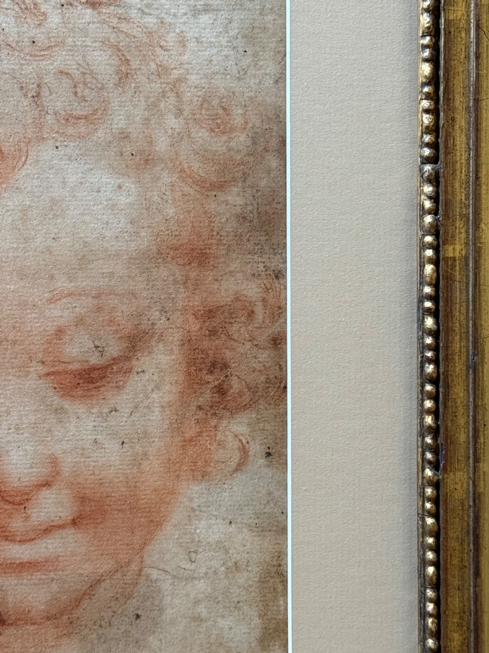 CIRCLE OF MICHELANGELO ANSELMI (ITALIAN c. 1492 – c. 1554) - A RED CHALK RENAISSANCE DRAWING OF A CHILDS FACE.
 View IV
