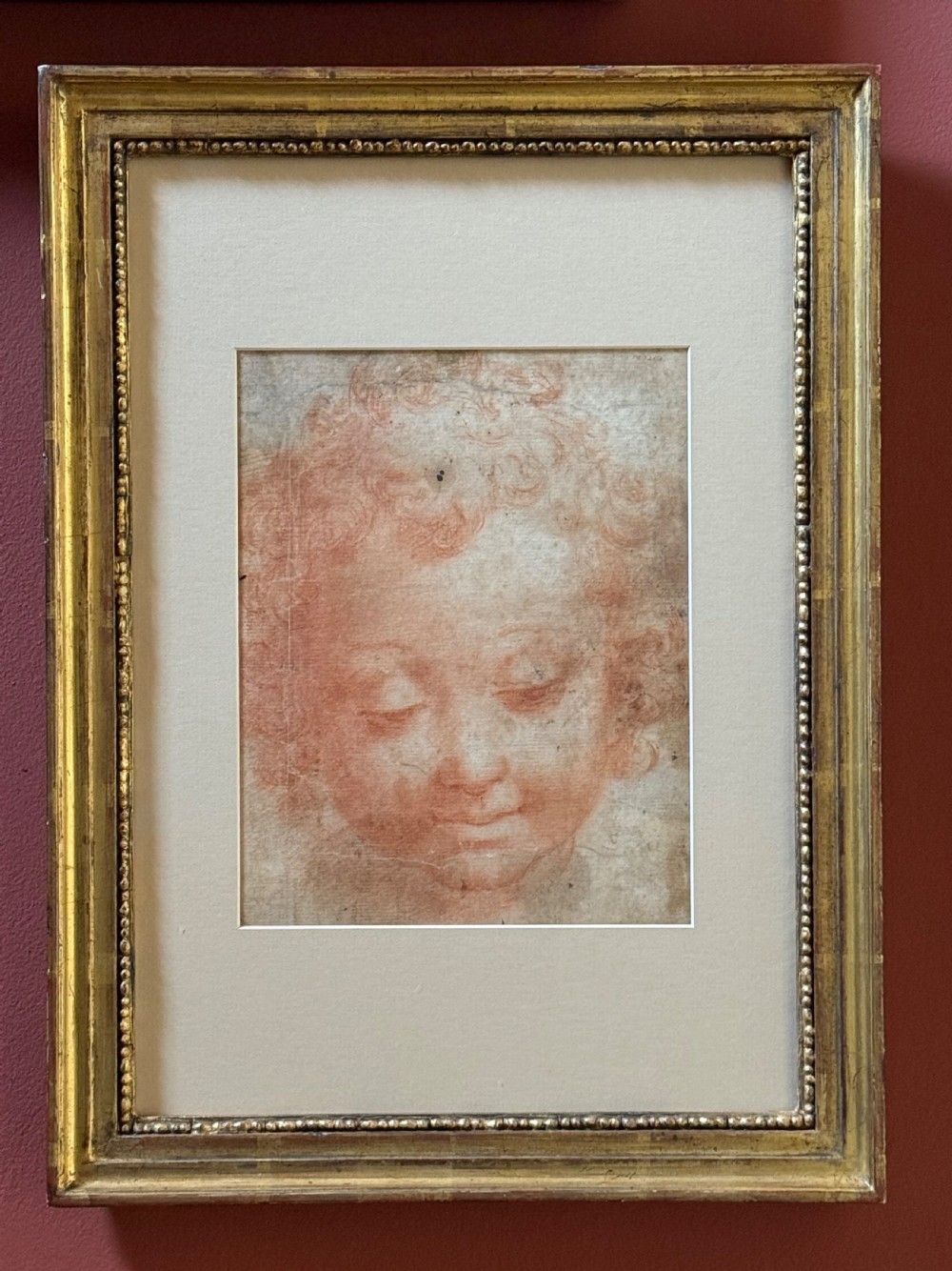 CIRCLE OF MICHELANGELO ANSELMI (ITALIAN c. 1492 – c. 1554) - A RED CHALK RENAISSANCE DRAWING OF A CHILDS FACE.
 View VIII