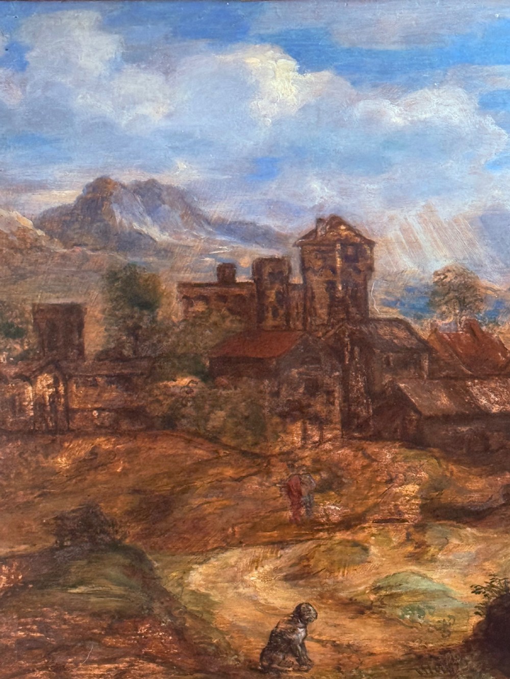 An oil painting on wooden panel depicting an idyllic pastoral landscape with classical figures, stone buildings, and distant mountains, set within a carved gilded frame. View IV