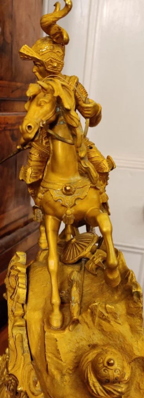 fig 1. Port Z 23/Nov24 A French Gilt Bronze figural Mantle Clock of a mediaeval Knight in armour on horseback holding a sword, riding to battle.