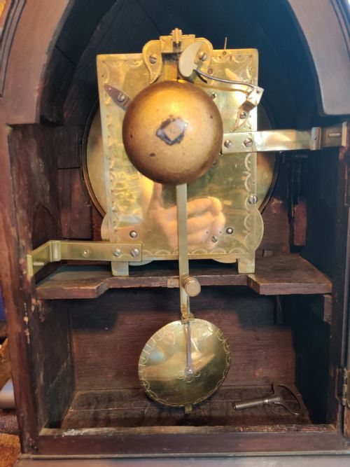 fig 1. Georgian Lancet Top, Mahogany and brass inlaid striking, 8 day Bracket Clock.
Circa 1810.