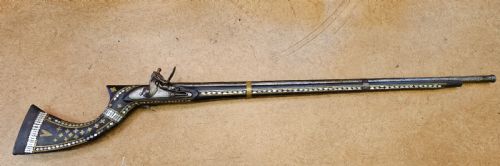 Ottoman Flintlock Jezail
with Mother-of-pearl & Brass Inlay Throughout .
Early 19th Century.