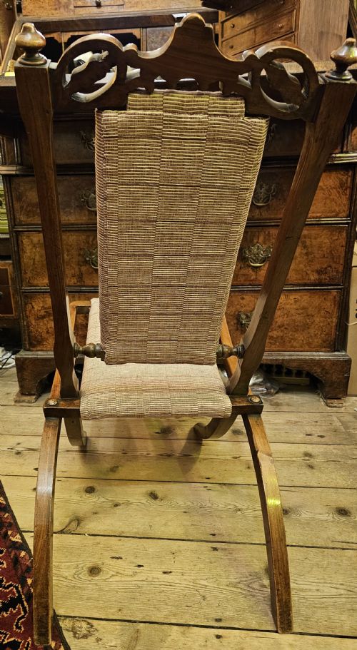 A RARE WALNUT FOLDING CAMPAIGN CHAIR IN EXCELLENT CONDITION 19TH CENTURY WITH PIERCED CARVED CREST RAIL FLUTING AND BONE BUTTON DECORATIONS - ADDITIONAL PHOTO 9