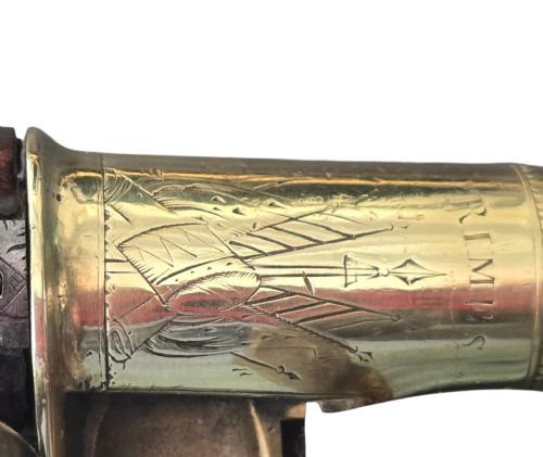 fig 6. A pair of 18th-century English flintlock turn-off pistols featuring brass cannon barrels, steel lock mechanisms, and smooth walnut stocks.