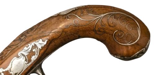 QUEEN ANNE SILVERMOUNTED 18 BORE FLINTLOCK HOLSTER PISTOL BY R WILLOUGHBY BIRMINGHAMEARLY 18THCENTURY ENGLISH FLINTLOCK PISTOL SILVERWIRE INLAID WALNUT GRIP SILVER GROTESQUE BUTT CAP WITH SILVER VACANT CARTOUCHES TO THE TOP AND THE SIDE OF THE STOCK CIRCA 1730 - ADDITIONAL PHOTO 11