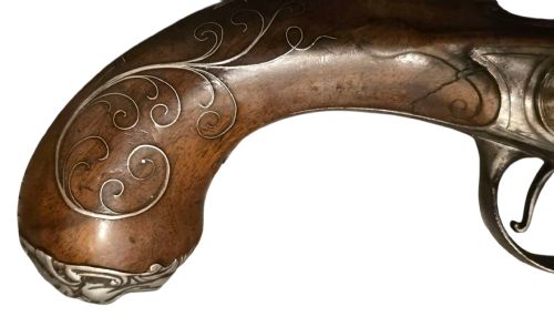 QUEEN ANNE SILVERMOUNTED 18 BORE FLINTLOCK HOLSTER PISTOL BY R WILLOUGHBY BIRMINGHAMEARLY 18THCENTURY ENGLISH FLINTLOCK PISTOL SILVERWIRE INLAID WALNUT GRIP SILVER GROTESQUE BUTT CAP WITH SILVER VACANT CARTOUCHES TO THE TOP AND THE SIDE OF THE STOCK CIRCA 1730 - ADDITIONAL PHOTO 14