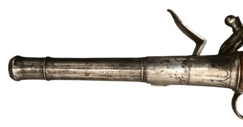 QUEEN ANNE SILVERMOUNTED 18 BORE FLINTLOCK HOLSTER PISTOL BY R WILLOUGHBY BIRMINGHAMEARLY 18THCENTURY ENGLISH FLINTLOCK PISTOL SILVERWIRE INLAID WALNUT GRIP SILVER GROTESQUE BUTT CAP WITH SILVER VACANT CARTOUCHES TO THE TOP AND THE SIDE OF THE STOCK CIRCA 1730 - ADDITIONAL PHOTO 16