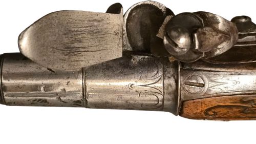 QUEEN ANNE SILVERMOUNTED 18 BORE FLINTLOCK HOLSTER PISTOL BY R WILLOUGHBY BIRMINGHAMEARLY 18THCENTURY ENGLISH FLINTLOCK PISTOL SILVERWIRE INLAID WALNUT GRIP SILVER GROTESQUE BUTT CAP WITH SILVER VACANT CARTOUCHES TO THE TOP AND THE SIDE OF THE STOCK CIRCA 1730 - ADDITIONAL PHOTO 23