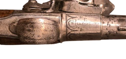 QUEEN ANNE SILVERMOUNTED 18 BORE FLINTLOCK HOLSTER PISTOL BY R WILLOUGHBY BIRMINGHAMEARLY 18THCENTURY ENGLISH FLINTLOCK PISTOL SILVERWIRE INLAID WALNUT GRIP SILVER GROTESQUE BUTT CAP WITH SILVER VACANT CARTOUCHES TO THE TOP AND THE SIDE OF THE STOCK CIRCA 1730 - ADDITIONAL PHOTO 24