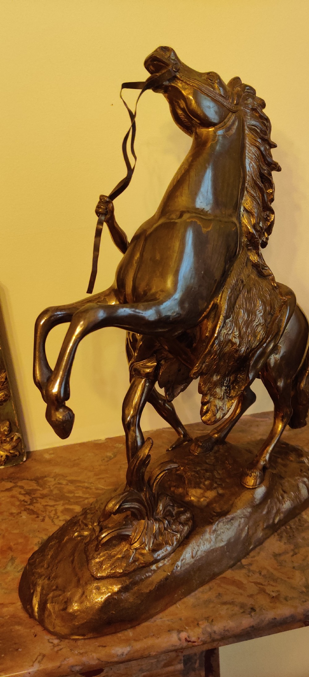 A PAIR OF LATE 19TH CENTURY GILT BRONZE FRENCH MARLY HORSES.
After GUILLAUME COSTOU THE ELDER (French, 1677-1746).  View VII