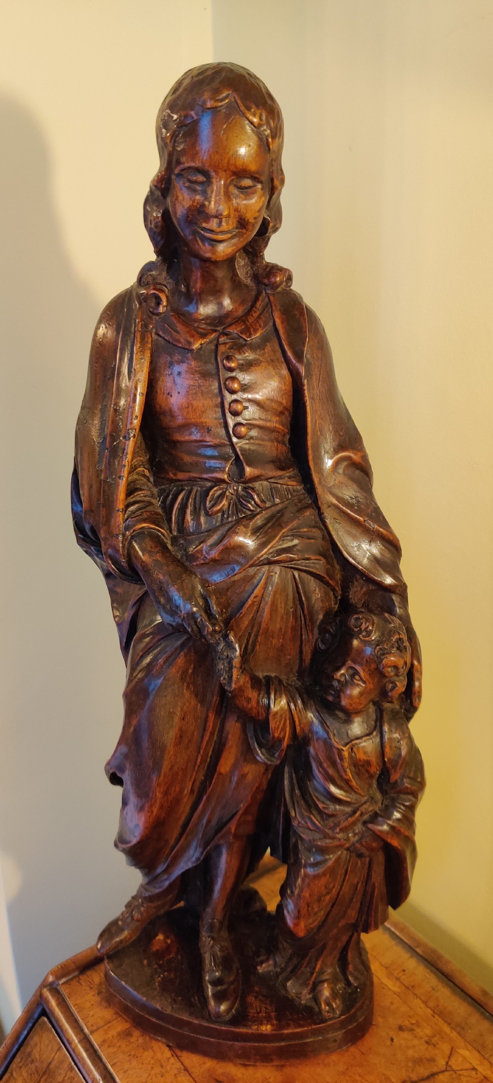 A rare 17th century, well carved Walnut figure of Saint Elizabeth and John the Baptist as a child. 