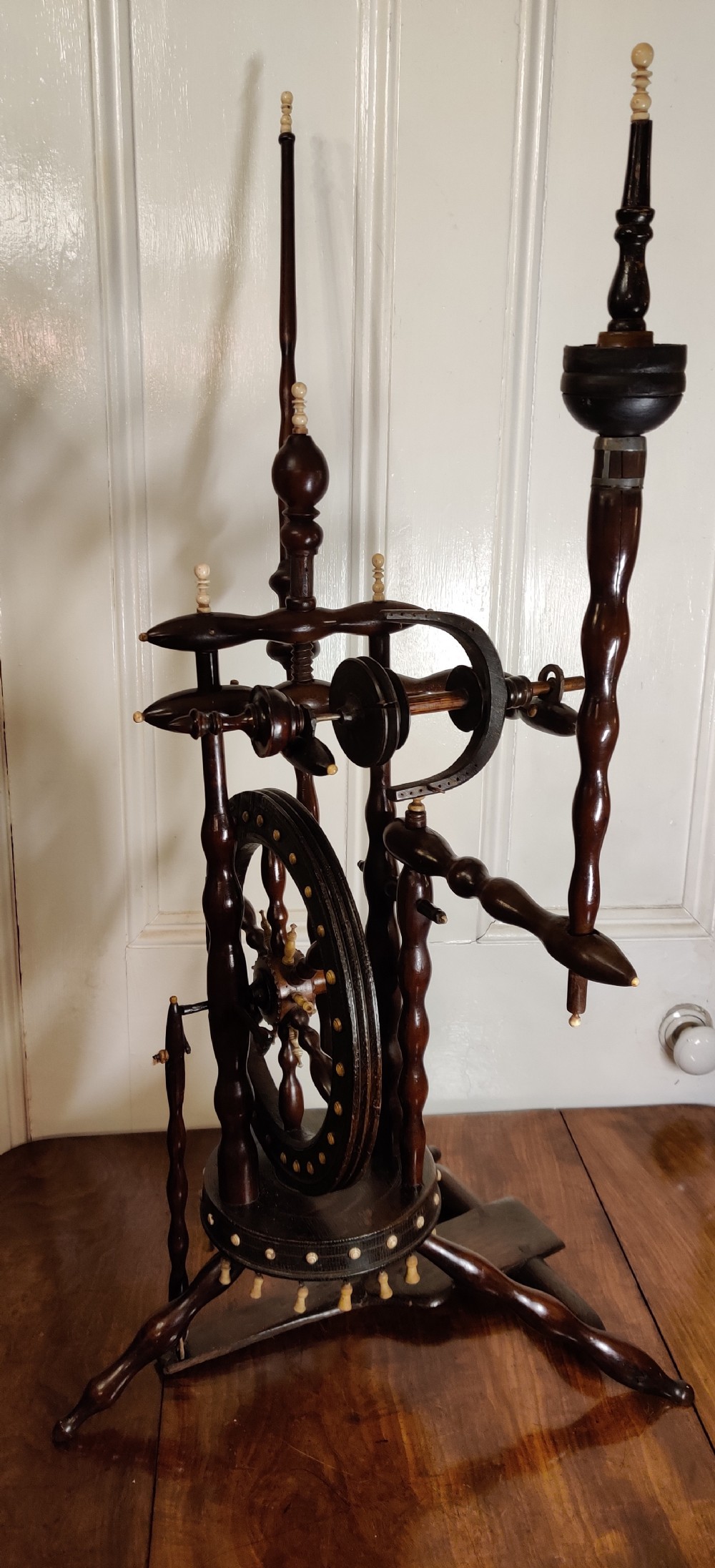 A rare Castle upright Spinning Wheel, German.  View II