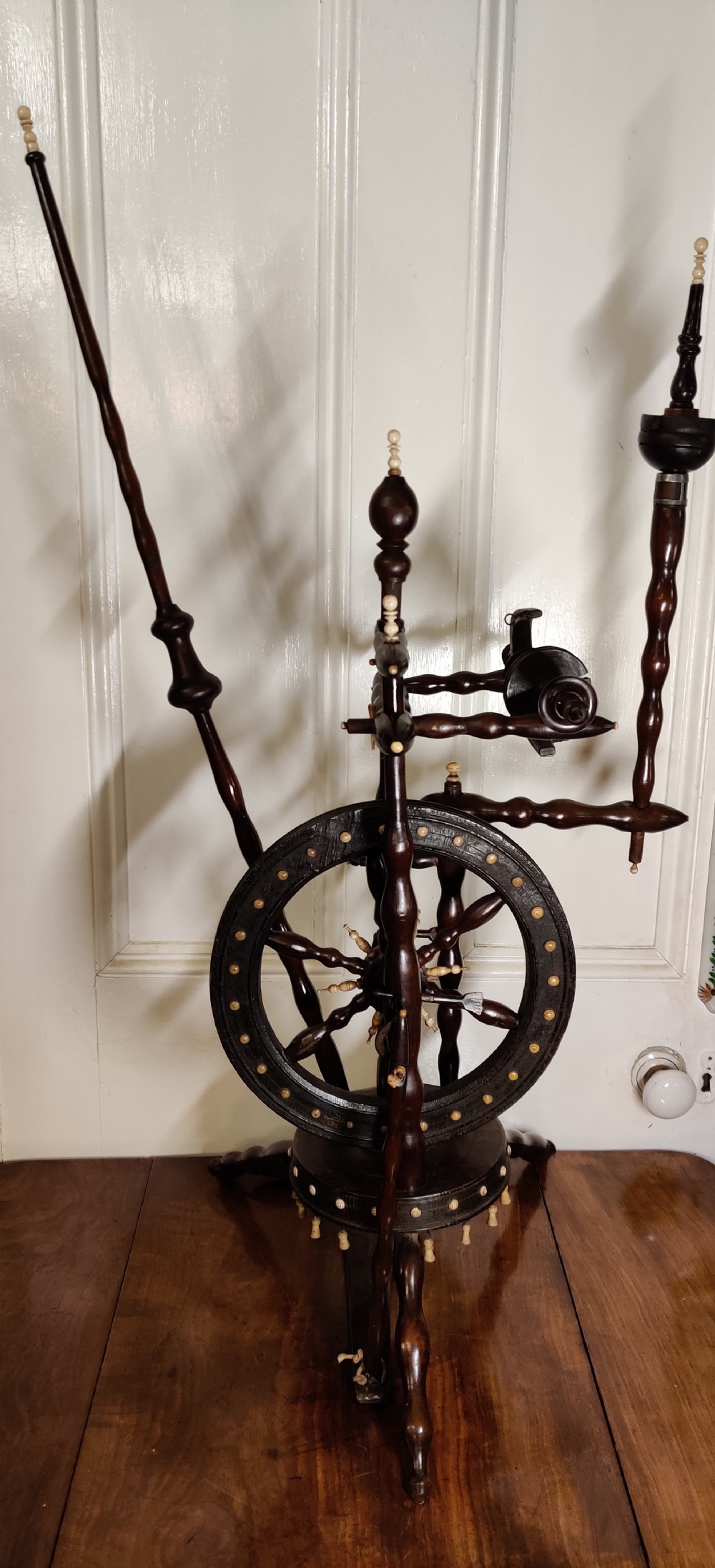 A rare Castle upright Spinning Wheel, German.  View VII
