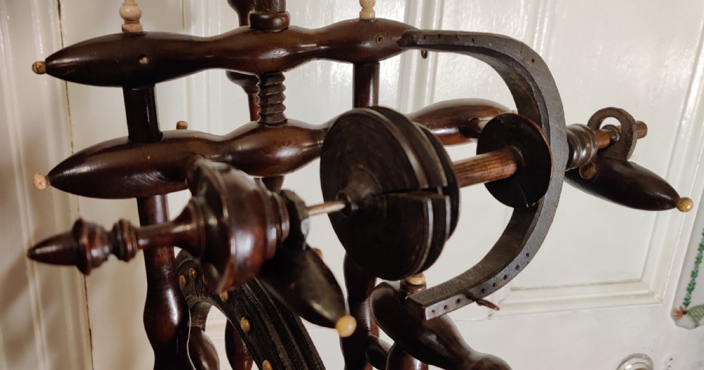 A rare Castle upright Spinning Wheel, German.  View IX