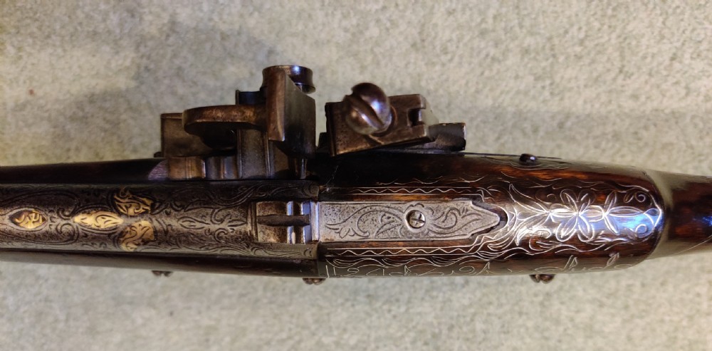 EARLY 19TH CENTURY AFGHAN JEZAIL MUSKET. Decorated with silver inlay.  View IX