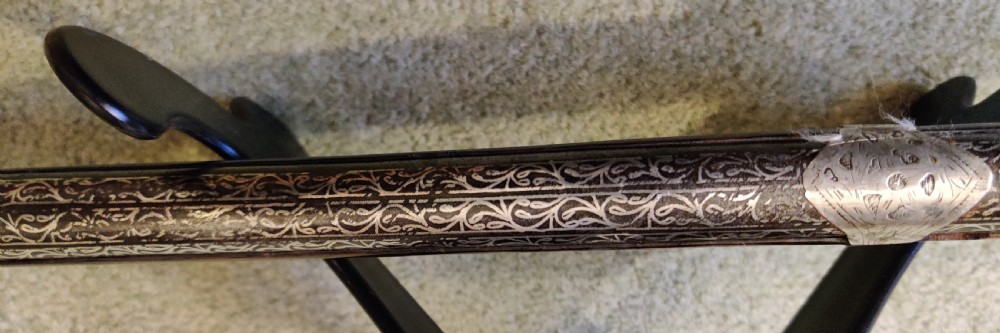 EARLY 19TH CENTURY AFGHAN JEZAIL MUSKET. Decorated with silver inlay.  View XIV