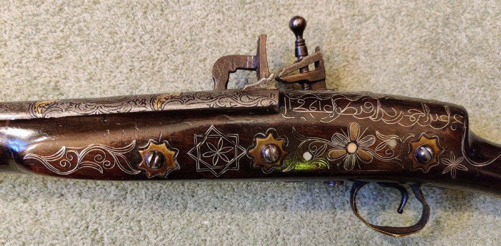 EARLY 19TH CENTURY AFGHAN JEZAIL MUSKET. Decorated with silver inlay.  View XV