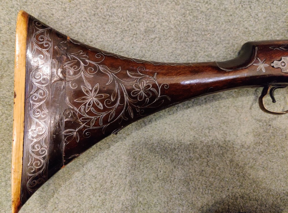 EARLY 19TH CENTURY AFGHAN JEZAIL MUSKET. Decorated with silver inlay.  View XVI