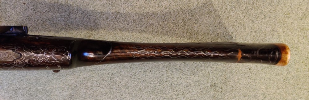 EARLY 19TH CENTURY AFGHAN JEZAIL MUSKET. Decorated with silver inlay.  View XVII