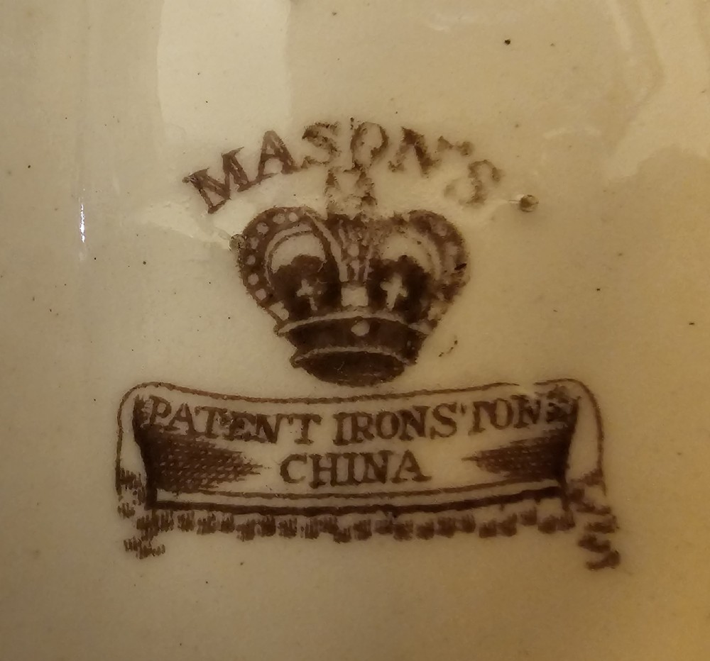 An ornate early 19th-century Masons ironstone double inkstand featuring a central sander, two lidded inkwells, and intricate Imari-style floral patterns. View II