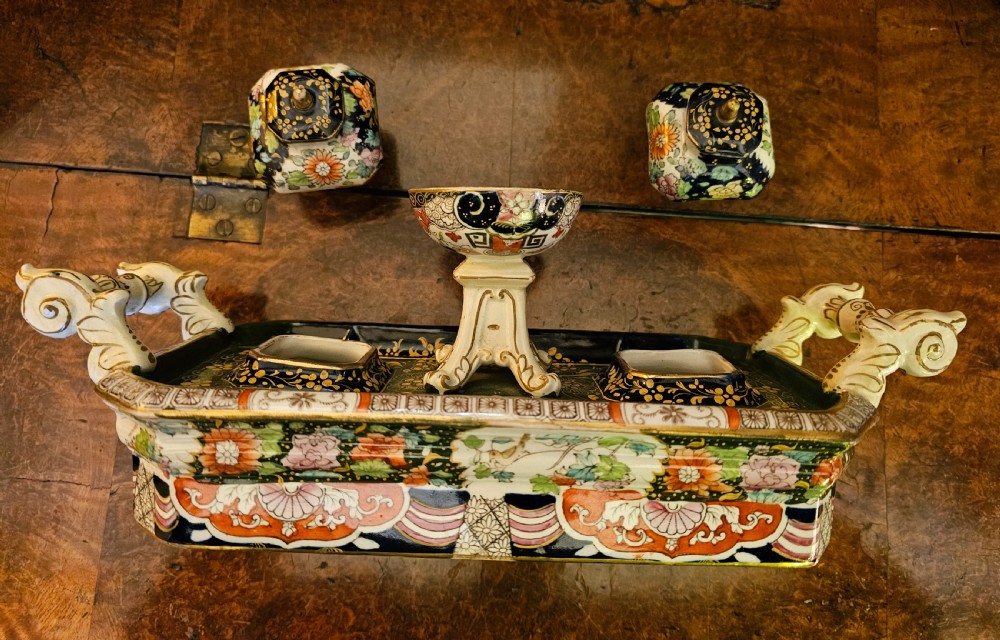 An ornate early 19th-century Masons ironstone double inkstand featuring a central sander, two lidded inkwells, and intricate Imari-style floral patterns. View IV