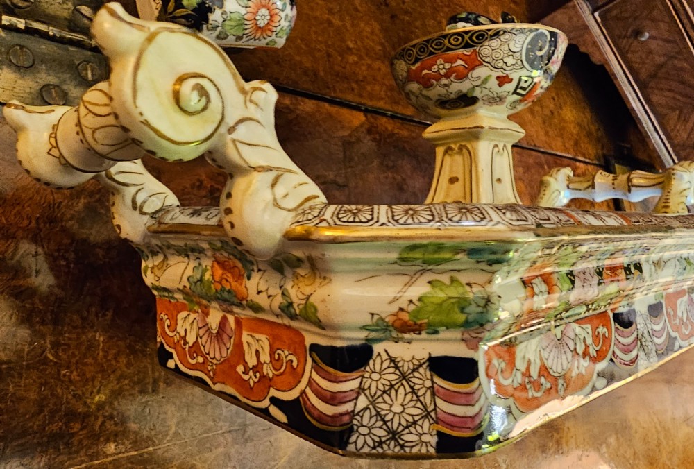 An ornate early 19th-century Masons ironstone double inkstand featuring a central sander, two lidded inkwells, and intricate Imari-style floral patterns. View VIII