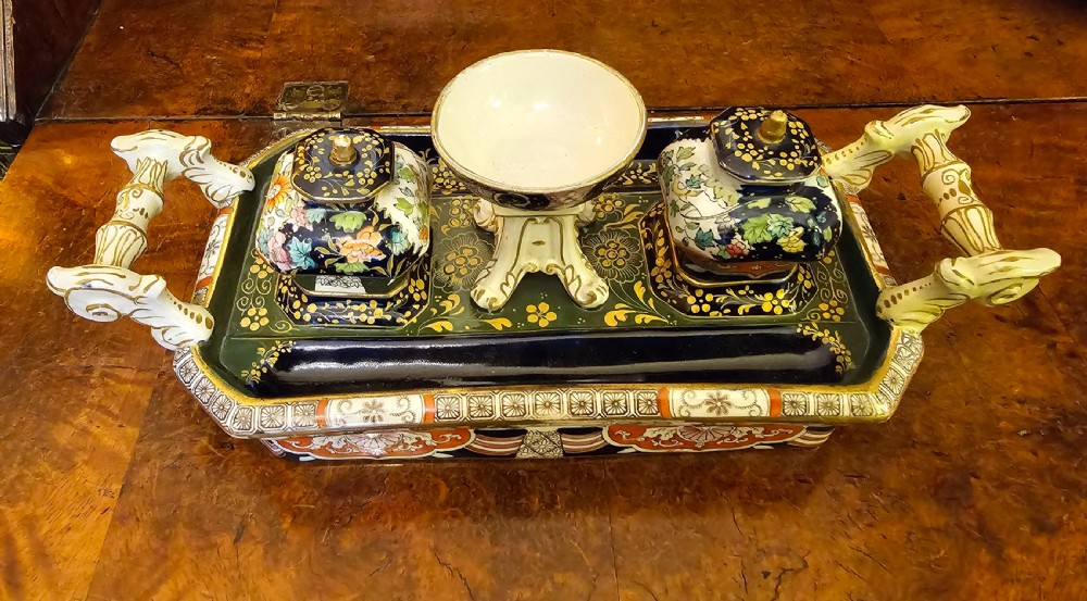 An ornate early 19th-century Masons ironstone double inkstand featuring a central sander, two lidded inkwells, and intricate Imari-style floral patterns. View XII
