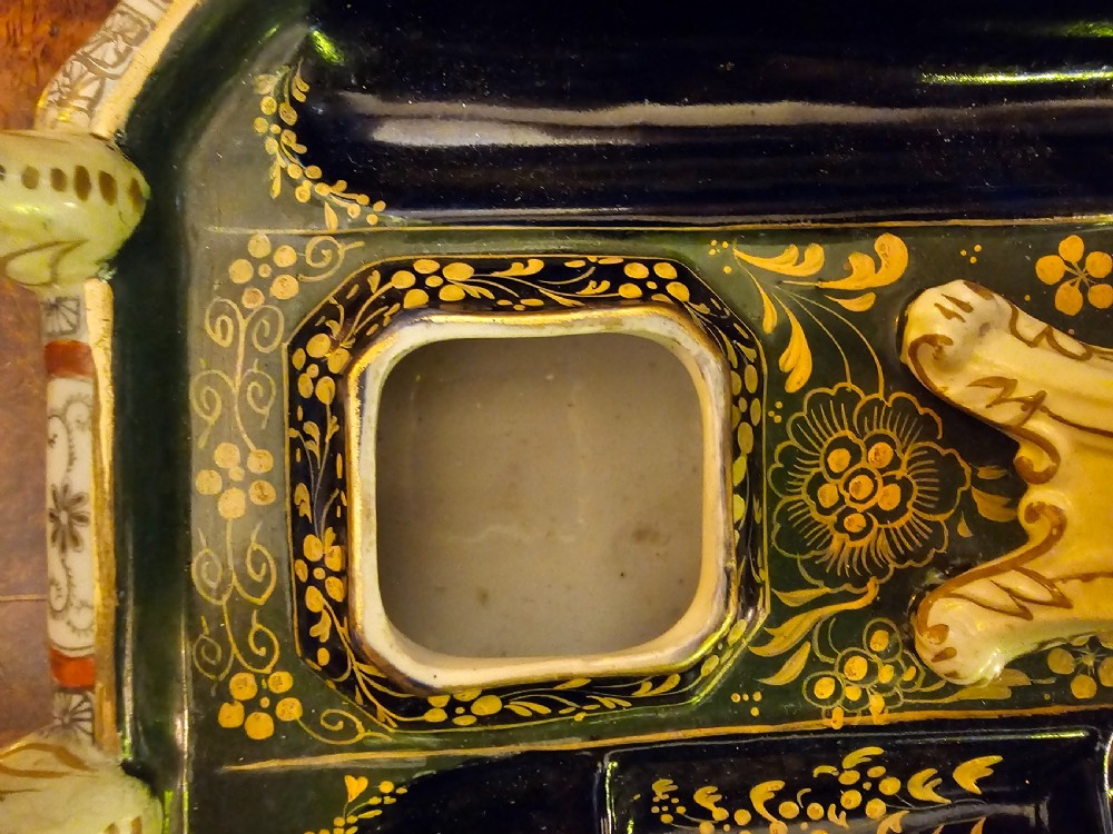 An ornate early 19th-century Masons ironstone double inkstand featuring a central sander, two lidded inkwells, and intricate Imari-style floral patterns. View XIV