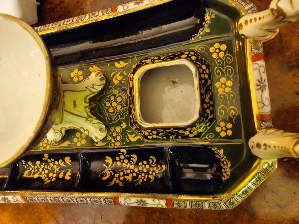 An ornate early 19th-century Masons ironstone double inkstand featuring a central sander, two lidded inkwells, and intricate Imari-style floral patterns. View XV