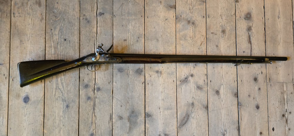 Georgian 'Brown Bess' flintlock musket with 39in barrel stamped with British proof marks.  View XXIX