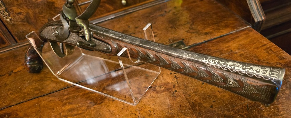 Ottoman Empire, Afghan  flintlock long pistol, with strongly swamped barrel, having Silver inlay.18th century.  View XXII