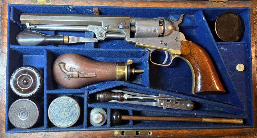 Cased Colt 1849 Pocket Revolver, .31 Calibre, . 
Serial No. 67417 for 1853. 