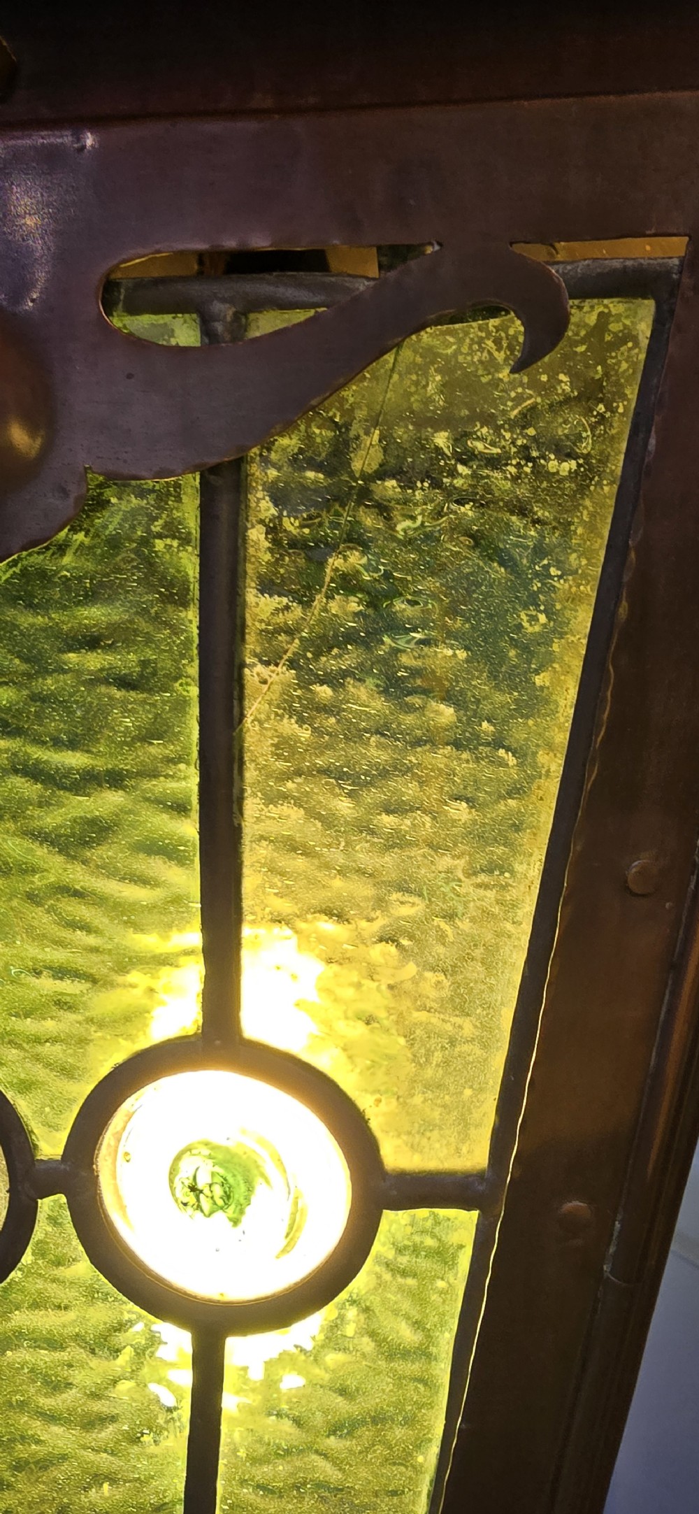 Arts & Crafts, Stained glass Hanging Lantern. Hand crafted in Bronze. English circa 1900; electrified.  With the original stained leaded glass  with  original finish. View XVI