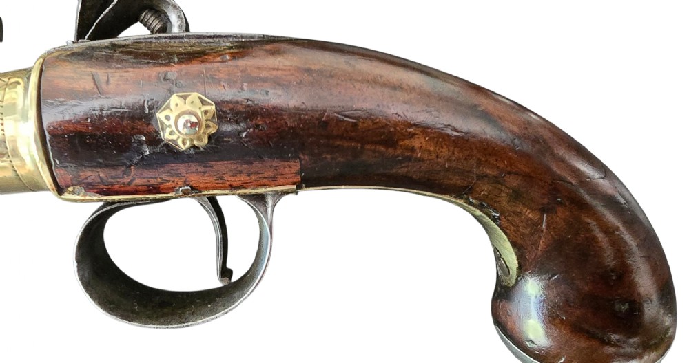 A pair of 18th-century English flintlock turn-off pistols featuring brass cannon barrels, steel lock mechanisms, and smooth walnut stocks. View XI
