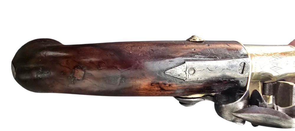 A pair of 18th-century English flintlock turn-off pistols featuring brass cannon barrels, steel lock mechanisms, and smooth walnut stocks. View XXI