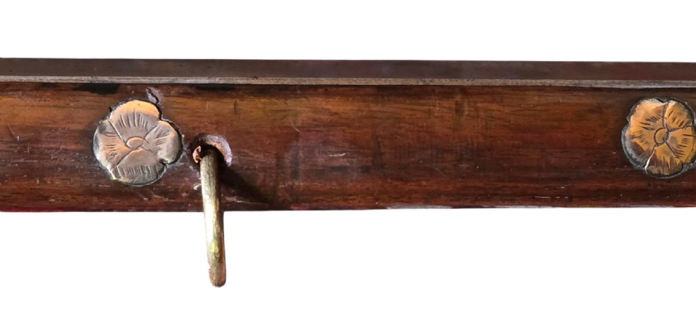 An 18th century Ottoman Algerian toe-lock long gun featuring a slender wooden stock decorated with brass bands and bone inlays. View X