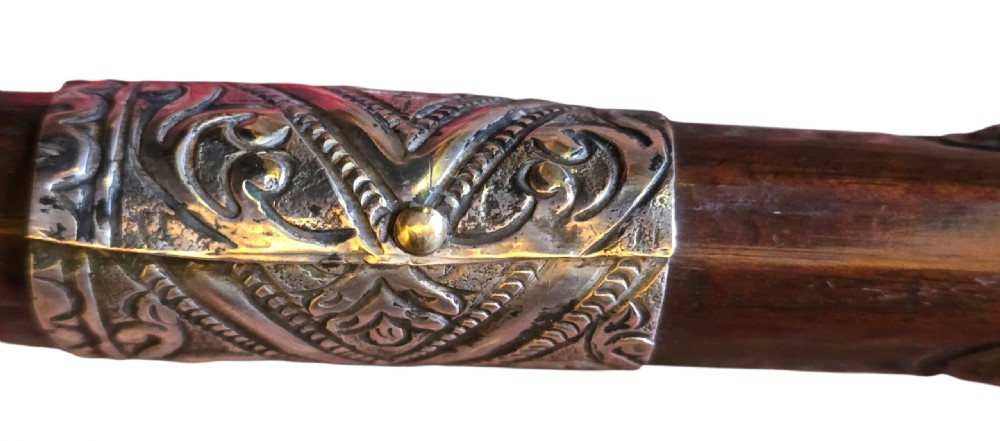 An 18th century Ottoman Algerian toe-lock long gun featuring a slender wooden stock decorated with brass bands and bone inlays. View XXIII