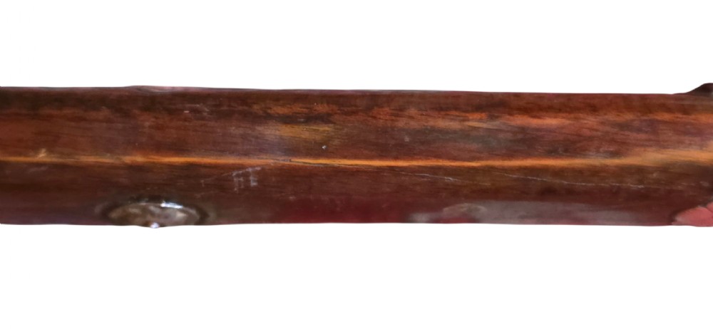 An 18th century Ottoman Algerian toe-lock long gun featuring a slender wooden stock decorated with brass bands and bone inlays. View XXIV