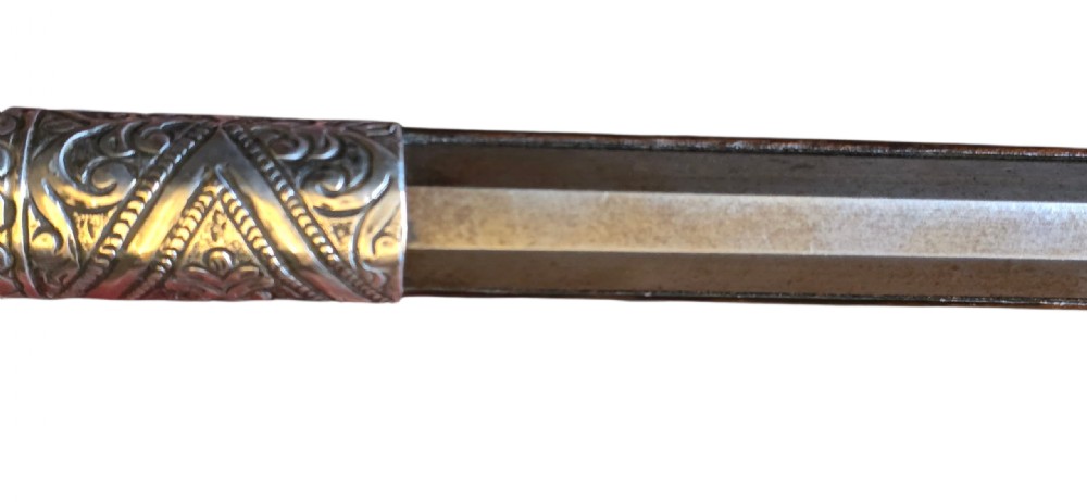 An 18th century Ottoman Algerian toe-lock long gun featuring a slender wooden stock decorated with brass bands and bone inlays. View XXIX