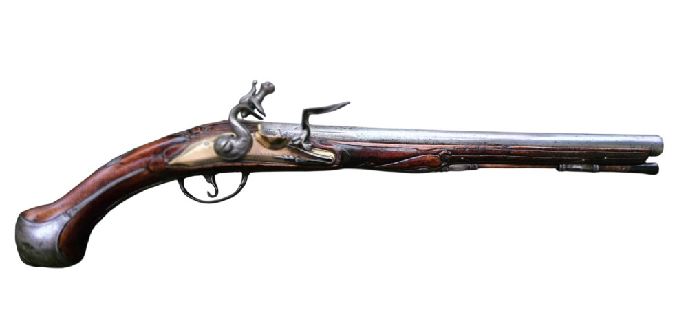 Fine German 18th C. Flintlock Holster Pistol by Hofmann, c.1750. With an ornately carved Walnut stock & brass lockplate. 