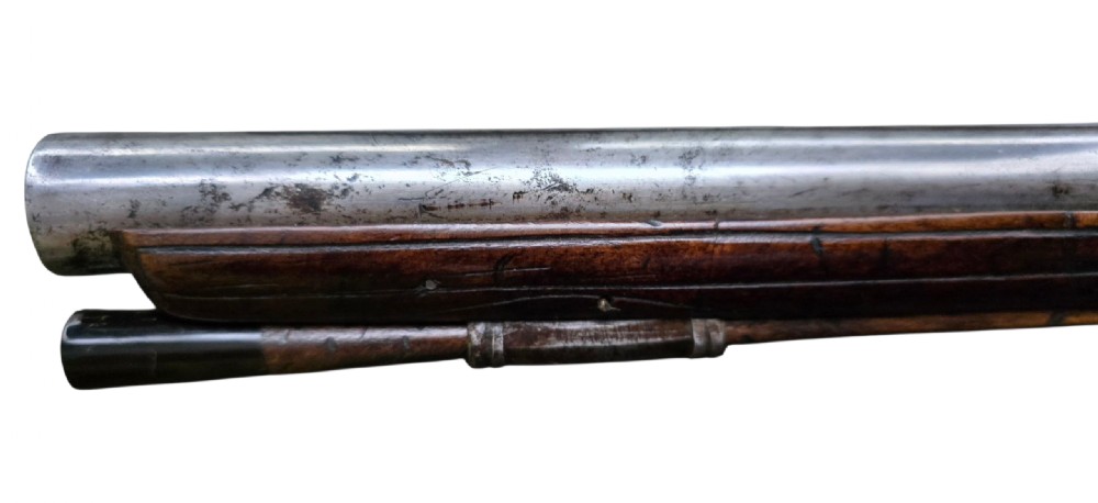 Fine German 18th C. Flintlock Holster Pistol by Hofmann, c.1750. With an ornately carved Walnut stock & brass lockplate.  View VIII