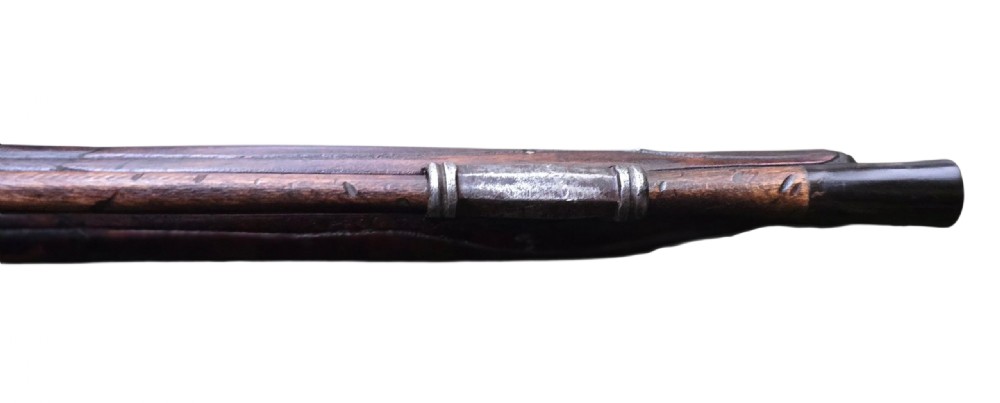 Fine German 18th C. Flintlock Holster Pistol by Hofmann, c.1750. With an ornately carved Walnut stock & brass lockplate.  View IX