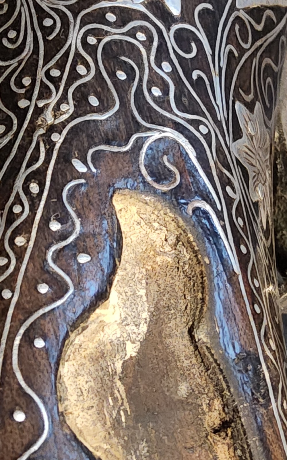 A 19th-century Ottoman flintlock holster pistol featuring intricate silver wire inlay along the wooden stock and barrel. View XXI