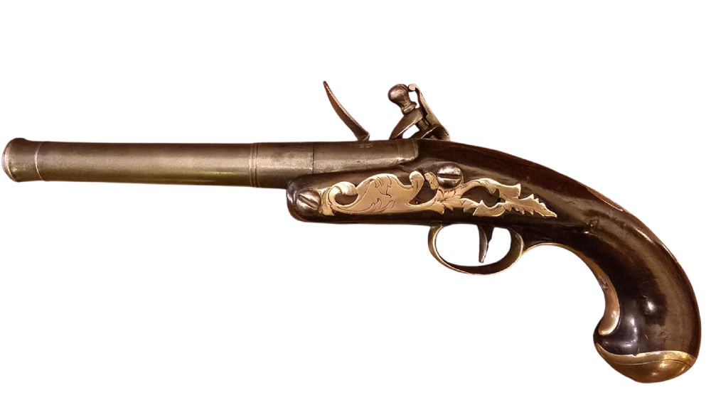 An 18th-century English Queen Anne flintlock turn-off pistol featuring an engraved steel mechanism, round steel barrel, dark walnut stock, and a brass butt cap. View XVIII